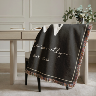 Custom woven throw blanket on a modern kitchen table in a beautiful farmhouse setting The Blanket Shop