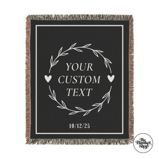 Black blanket with customizable text design and 'The Blanket Shop' branding.