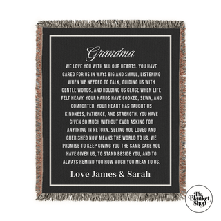Blanket with a message for 'Grandma' from James and Sarah on a black background.