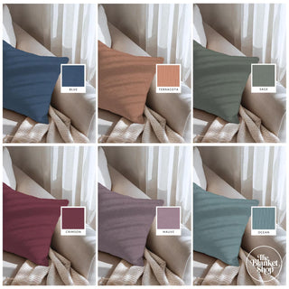 Collage of cotton throw pillows in various colors with color swatches on a neutral background from the Blanket Shop