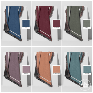 Collection of woven throw blankets in various colors with color swatches on a white background from The Blanket Shop