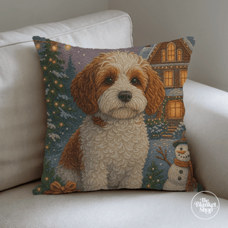 Custom Throw pillow with a dog and Christmas scene on a white couch and The Blanket Shop Logo