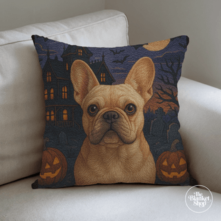Custom dog photo throw pillow with a halloween design on a couch with the Blanket Shop Logo