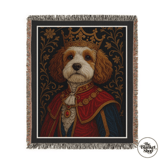 Custom throw blanket with a dog wearing a crown and robe design, featuring 'The Blanket Shop' logo.