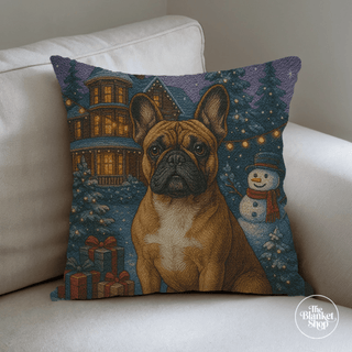 Custom throw pillow with a dog design and a Christmas scene with a snowman on a white couch with The Blanket Shop