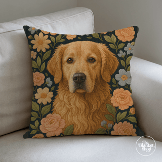 Floral custom throw pillow with a golden retriever design on a white couch with The Blanket Shop Logo