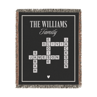 Personalized family blanket with crosswords of names on a black background from The Blanket Shop