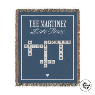 Personalized family blanket with crosswords of names on a blue background from The Blanket Shop