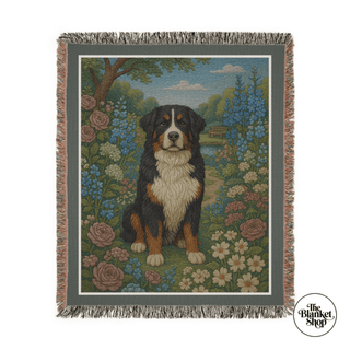 Personalized throw blanket with a bernese mountain dog and floral design, featuring 'The Blanket Shop' logo.