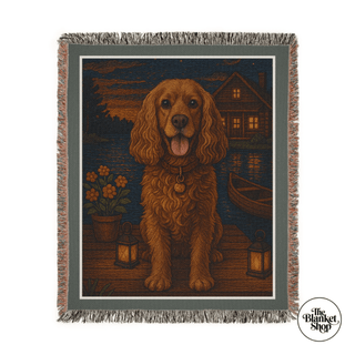 Personalized throw blanket with a dog design featuring a lake house and lanterns, branded 'The Blanket Shop'.