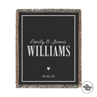 Personalized throw blanket with names and date on a black background with The Blanket Shop Logo