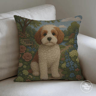 Personalized throw pillow with a dog design on a white couch with The Blanket Shop Logo
