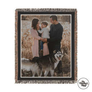 Personalized woven throw blanket with a family photo, featuring 'The Blanket Shop' branding.