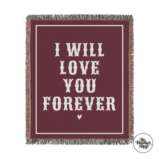 Red throw blanket with the text I will love you forever. 