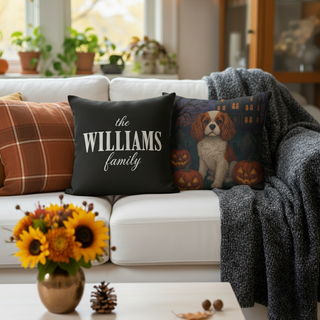 Throw pillows at halloween on a beige couch, the blanket shop