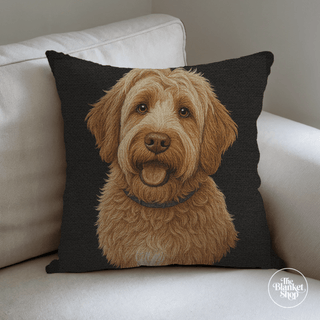 Woven Cotton Throw Pillow with a dog's face design on a white couch with The Blanket Shop Logo