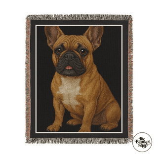 Woven blanket with a bull dog dog design on a black background, featuring 'The Blanket Shop' logo.

